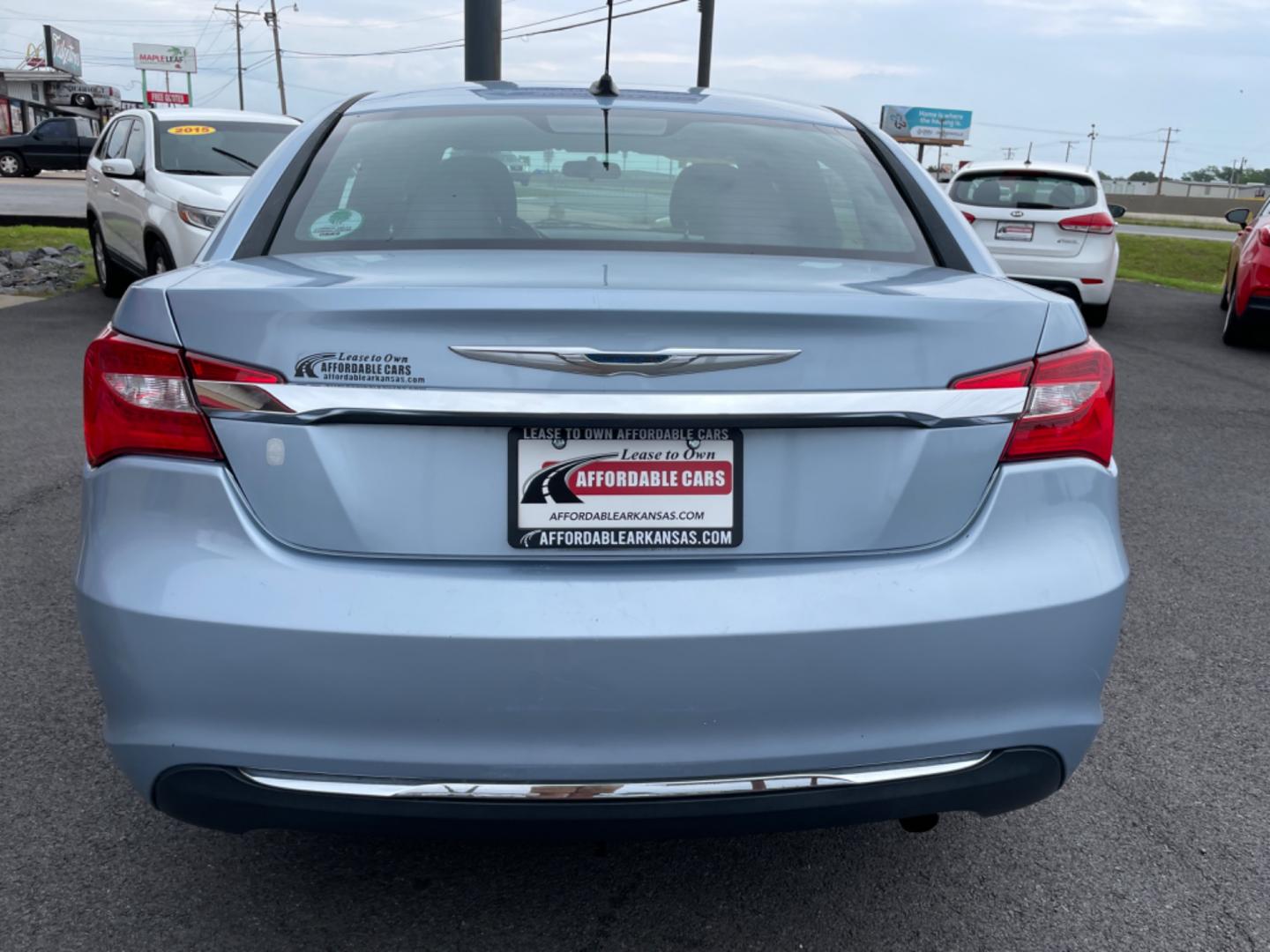 2014 Blue Chrysler 200 (1C3CCBAB0EN) with an 4-Cyl, 2.4 Liter engine, Automatic, 4-Spd transmission, located at 8008 Warden Rd, Sherwood, AR, 72120, (501) 801-6100, 34.830078, -92.186684 - Photo#6